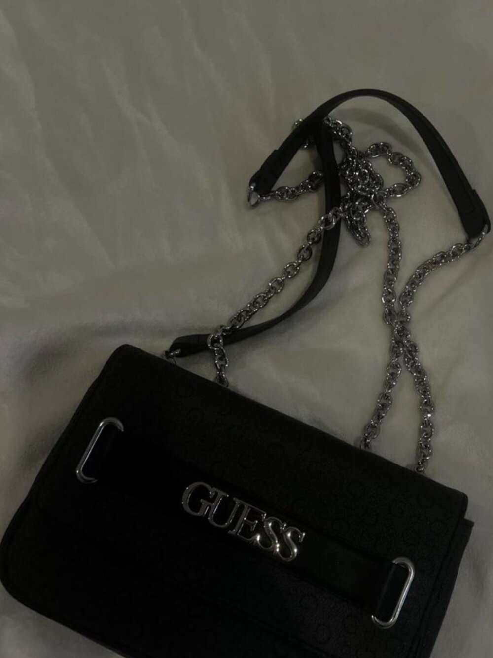 Black Guess crossbody bag with chain strap